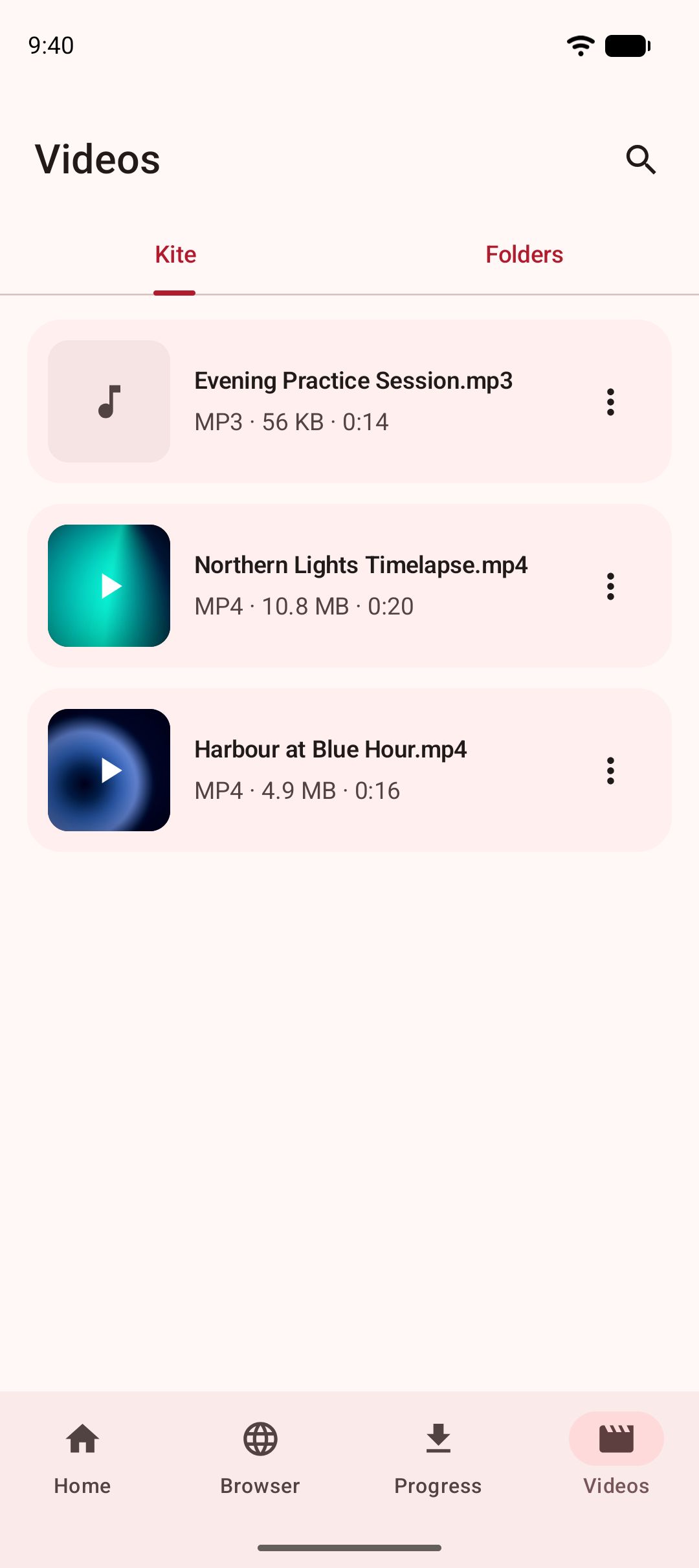 The Videos tab listing saved videos and music stored on the device.